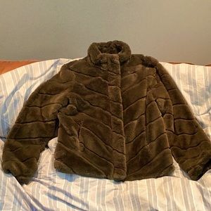 Green faux fur jacket. Pockets, zip up with 3snaps